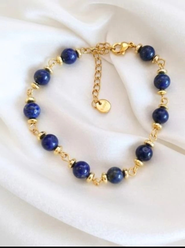 Pulsera Lapislázuli de piedra pulida y acero dorado