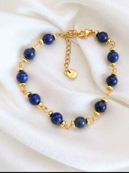 Pulsera Lapislázuli de piedra pulida y acero dorado