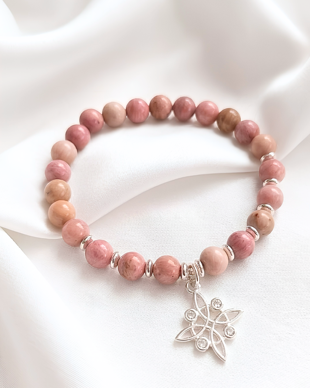 Pulsera de piedra Rodocrosita y nudo de bruja de plata