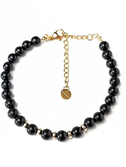 Pulsera de piedra Turmalina y detalles dorados