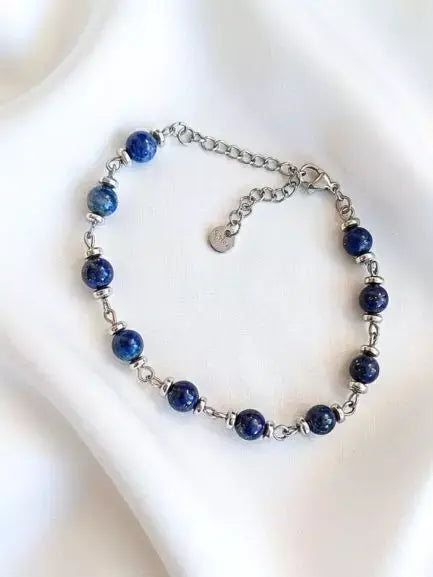 Pulsera Lapislázuli de piedra pulida y acero dorado